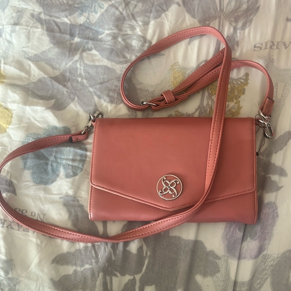 Dark pink small crossbody bag with silver accessories/add-ons